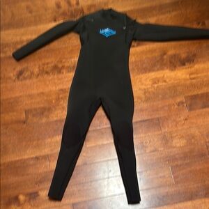 Rip curl size 12 jr Black Wetsuit 4/5 thickness